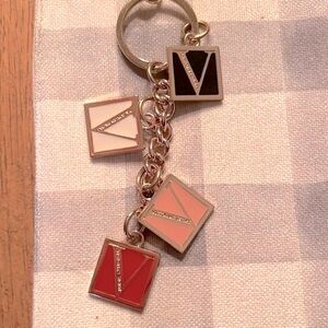 RETIRED VS goldtone key ring! I had this hanging from my mirror in my car.